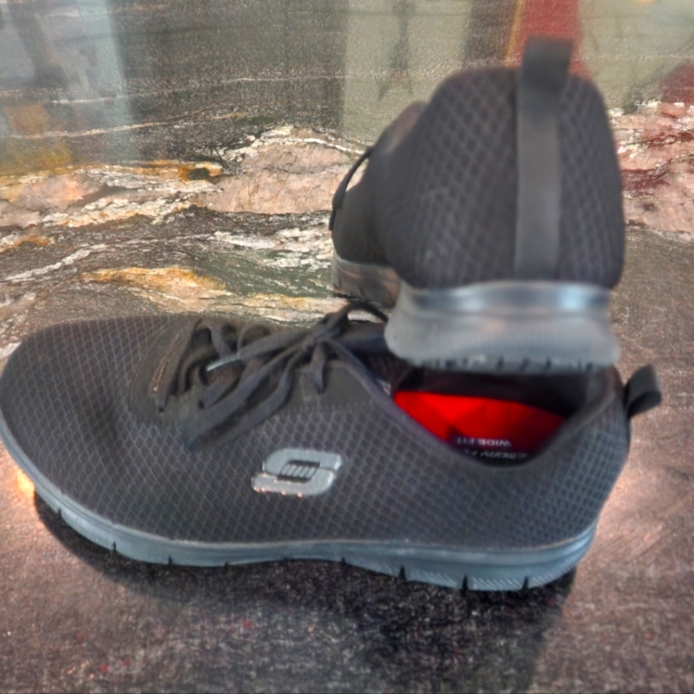 Women's black Skechers comfy work shoes